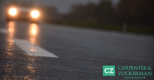 Car traveling on a wet road