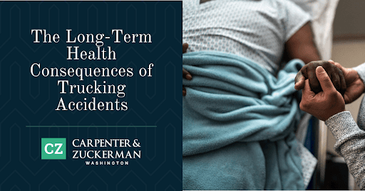 Man in hospital bed having his hand held my his family member